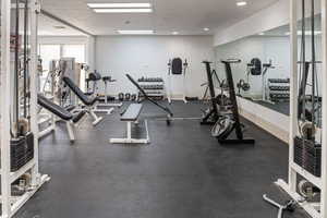 Gym with a textured ceiling