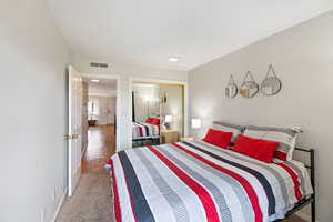 View of carpeted bedroom