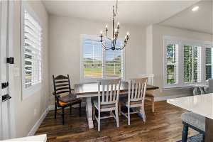 View of wood floored dining space