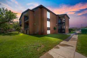 View of outdoor building at dusk