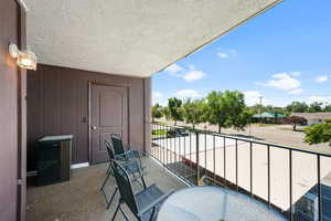 View of balcony with large storage room