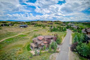 Birds eye view of property and 14th tee boxes