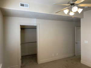 Bedroom with carpet floors and ceiling fan