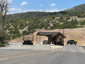 Exterior space with a mountain view and a carport