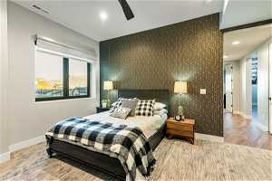 Bedroom featuring light hardwood flooring