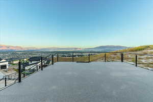 View of patio / terrace with balcony and a mountain view