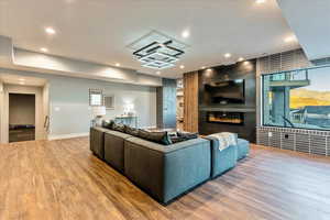 Hardwood floored living room with a fireplace