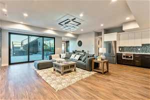 Living room with light hardwood flooring