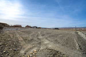 View of yard featuring a mountain view and a rural view