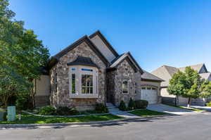 View of front of property featuring a garage