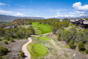 Birds eye view of property featuring a mountain view