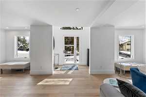 Interior space with light hardwood / wood-style floors and a wealth of natural light