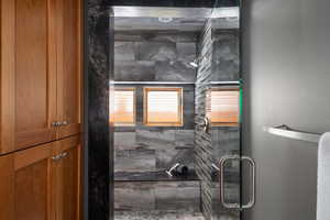 Bathroom featuring a stall shower