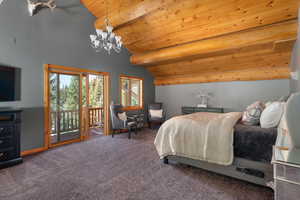 Carpeted bedroom featuring access to outside, a chandelier, wood ceiling, and baseboards