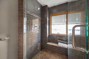 Full bathroom with a shower stall