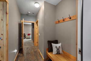 Mudroom featuring baseboards