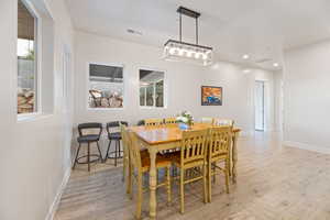 Dining space featuring light hardwood / wood-style floors