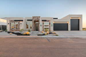 View of front facade with a garage