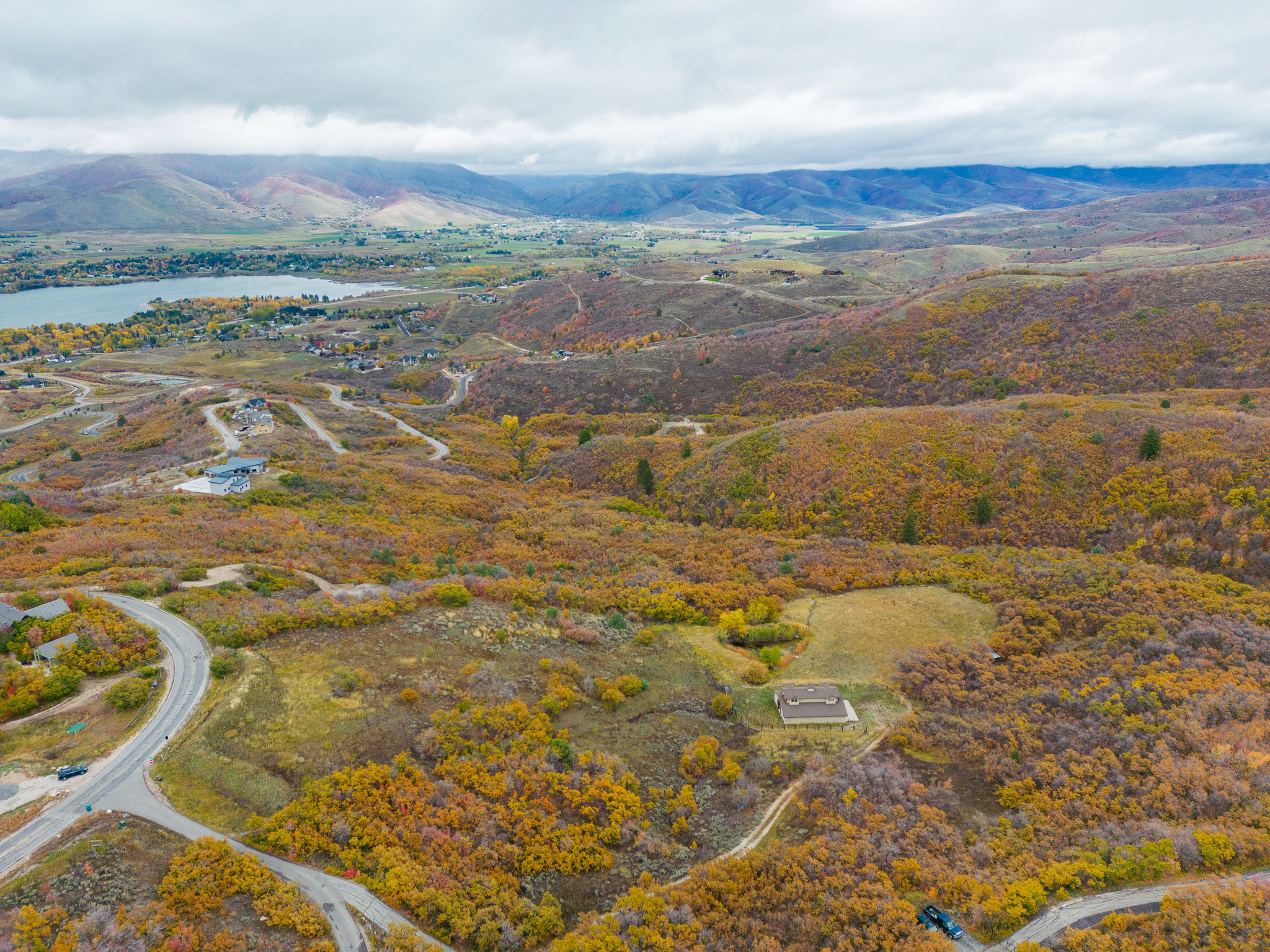 Bird's eye view with a water and mountain view