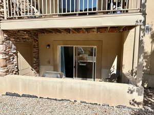 Doorway to property featuring a balcony