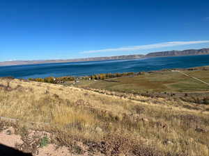 Property view of water with a mountain view