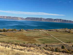 Property view of water with a mountain view