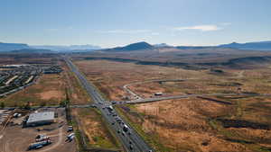 Birds eye view of property with a mountain view