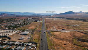 Birds eye view of property with a mountain view