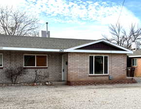 View of ranch-style home, West entrance.