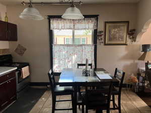 Dining room featuring tile floors