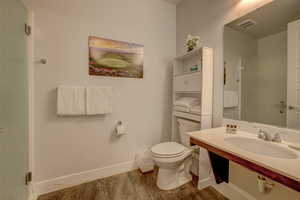 Bathroom with vanity and toilet