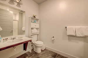 Bathroom featuring toilet and sink