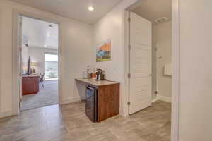 Interior space featuring an AC wall unit and tile floors