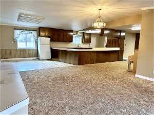 Spacious great room with kitchen, dining and family room
