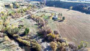 View of aerial view of home, Blacksmith Fork River and acreage