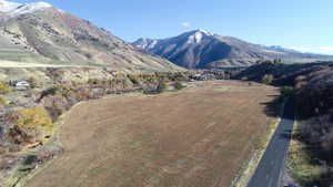 View of property, mountains and Blacksmith Fork River running through property