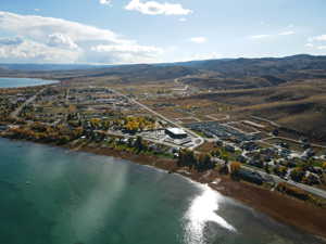 Bird's eye view featuring a water and mountain view