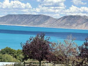 Property view of water with a mountain view