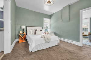 View of carpeted bedroom