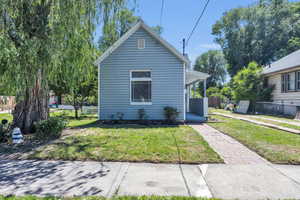 Exterior space with a front lawn