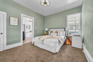 Bedroom featuring carpet.