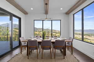 Large dining space, with sliding window door to outside upper deck.