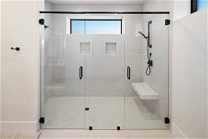 Basement 1 Bathroom: Guest bathroom shower, walk in level shower, bench, transit window.