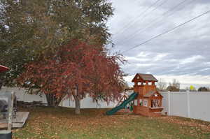 View of yard with a playground