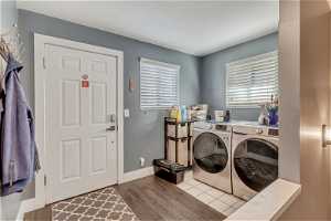 Main floor laundry just inside the side door. Mud room. Automatic locking door with security camera included!!