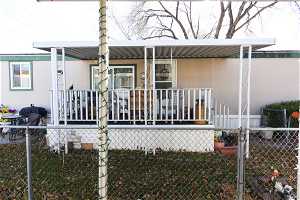 Manufactured / mobile home with a porch