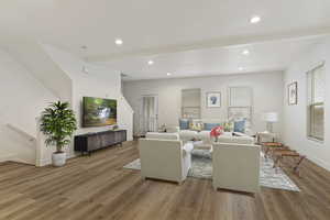 Living room with light wood-type flooring