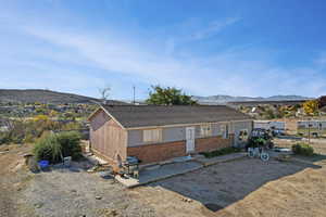 View of front of property featuring a mountain view