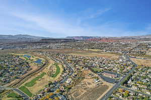 Birds eye view of property with a mountain view