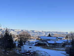 Exterior space featuring a mountain view